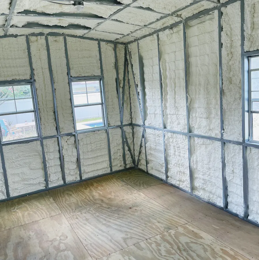 Closed-cell spray foam insulation applied to wall cavities in a residential project in Oak Grove